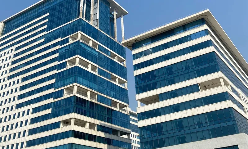 Modern glass office towers in Gurugram